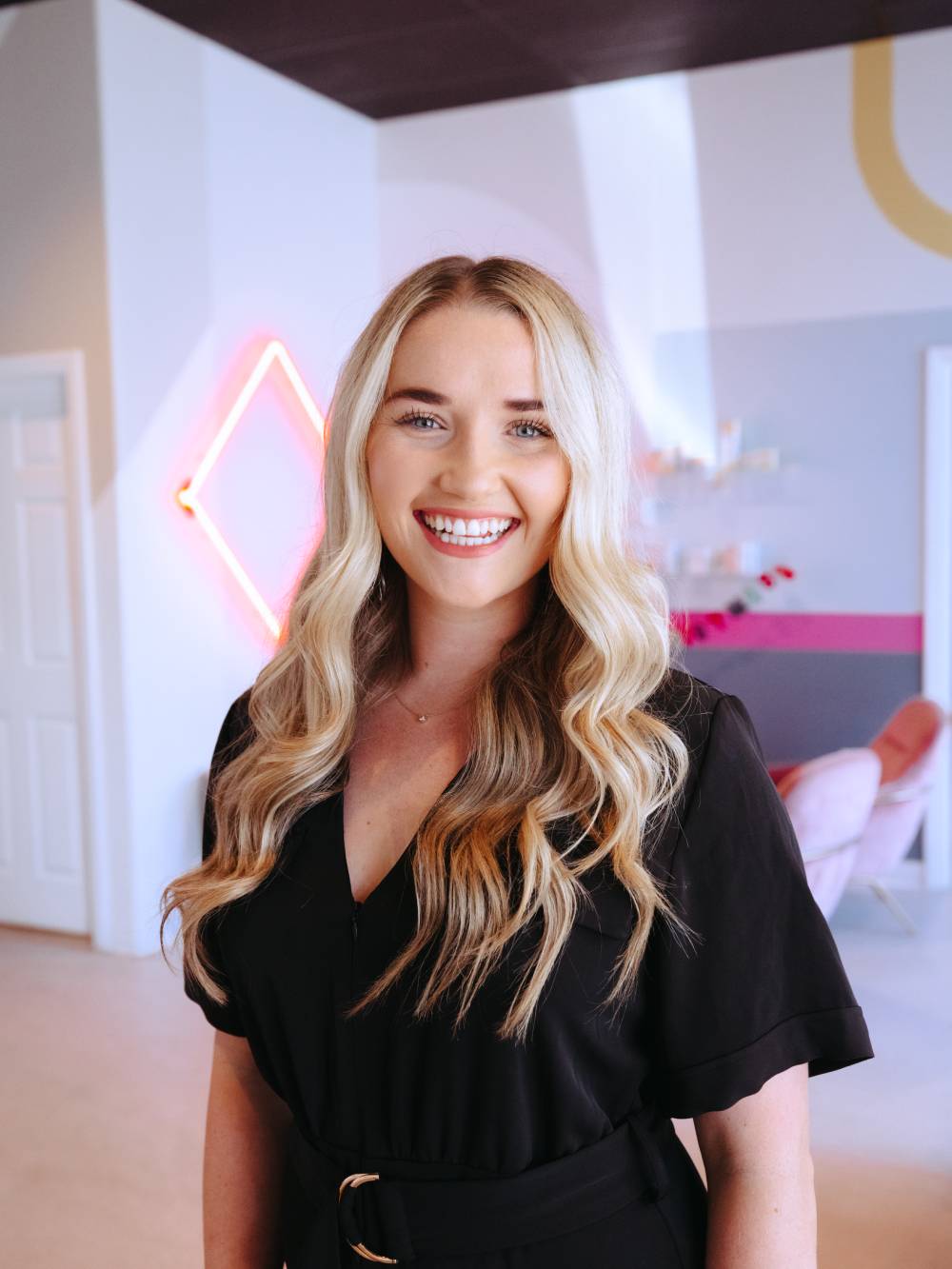 a woman smiling for the camera